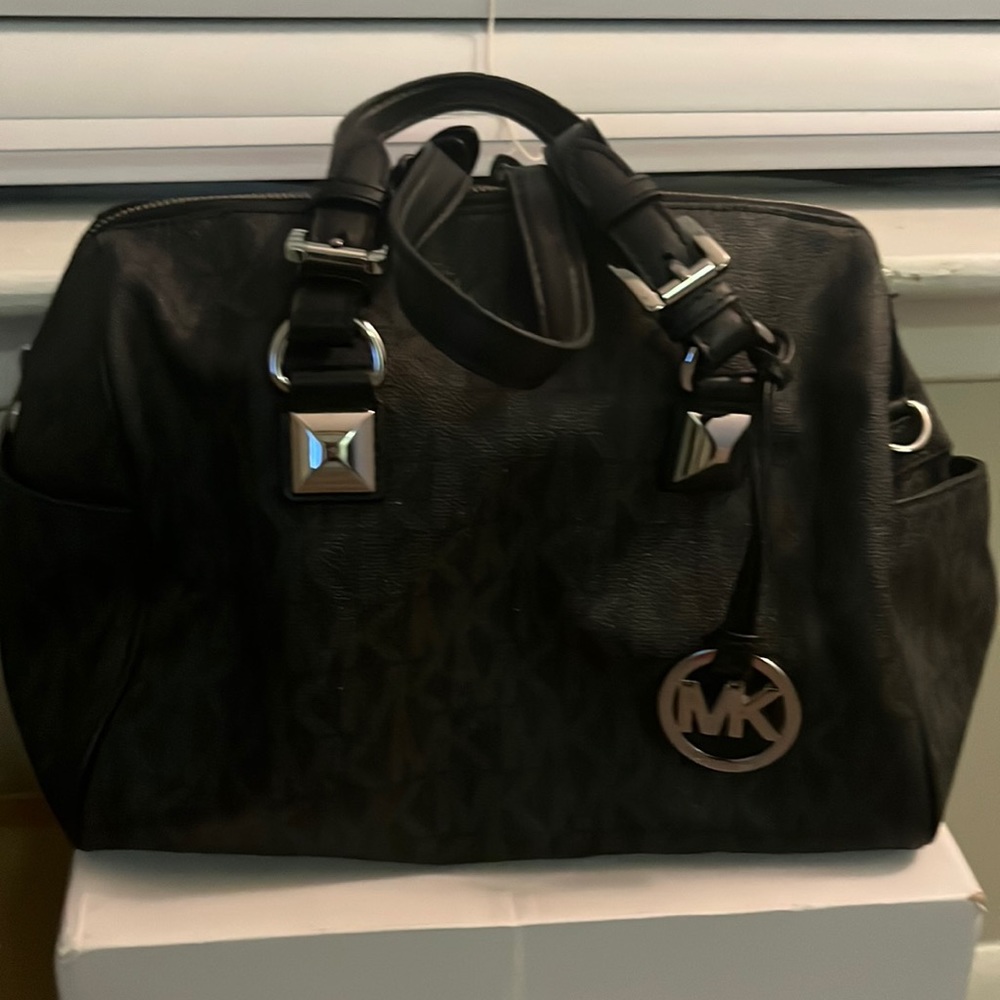 Black medium size in good condition